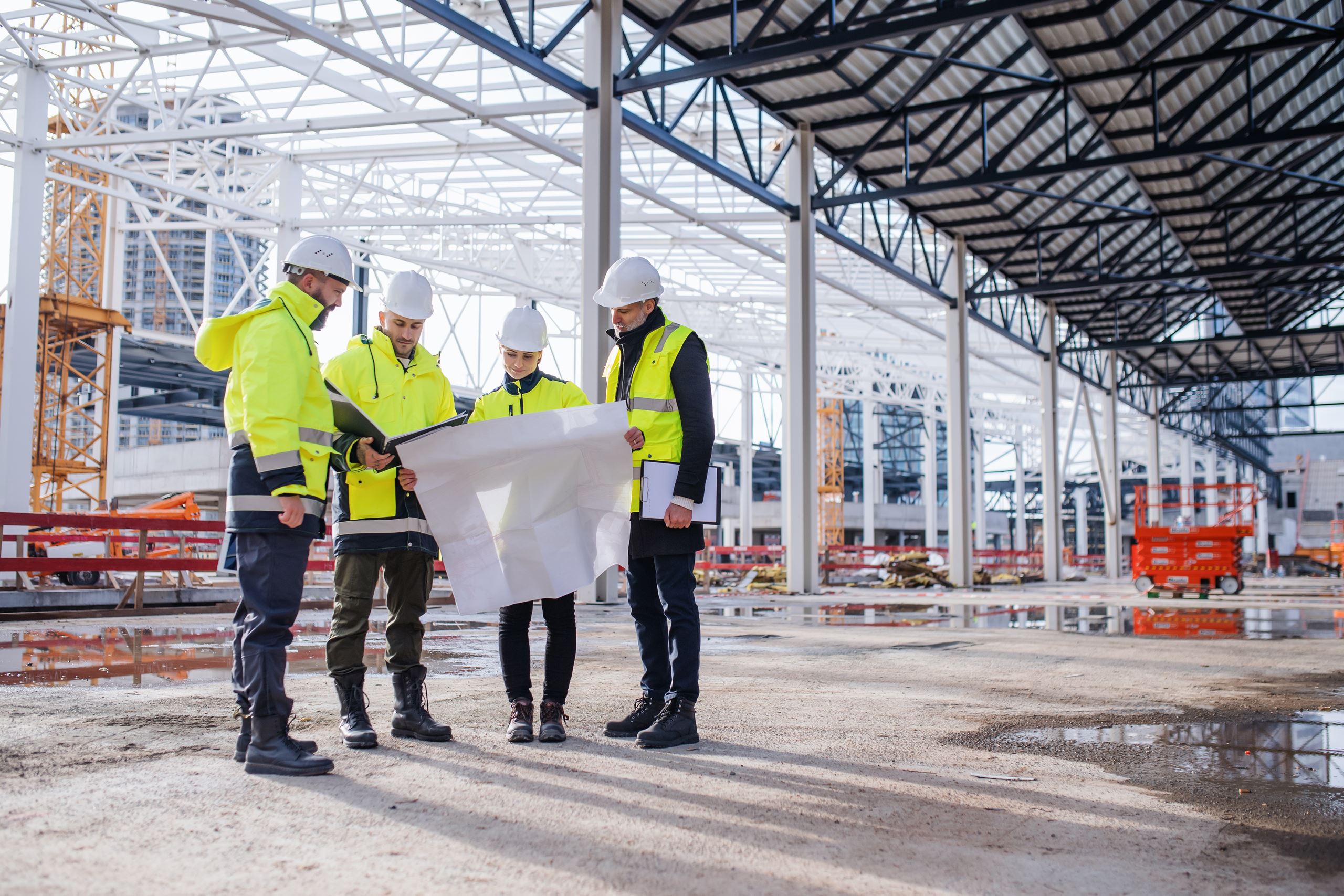 Construction workers planning in a meeting