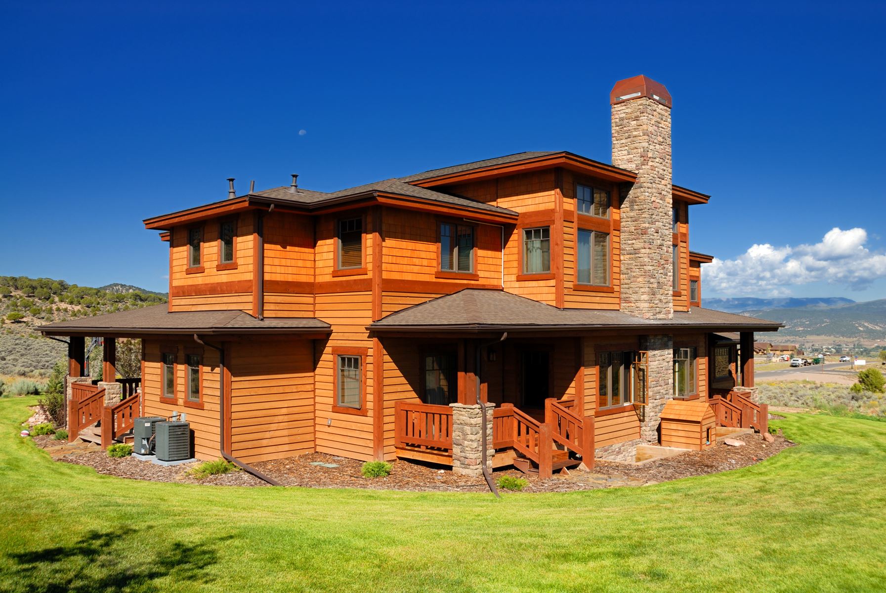 wood cabin like house in front of mountains