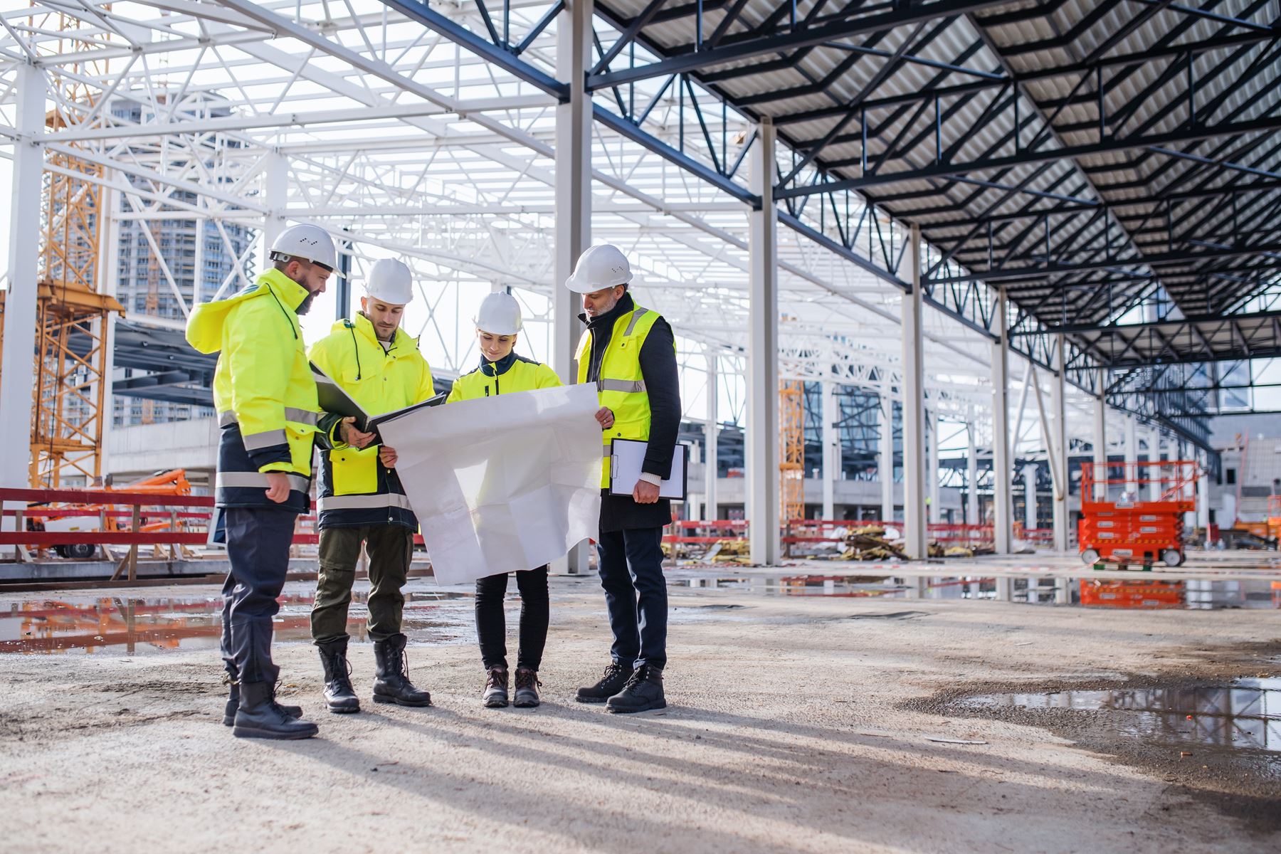 Construction workers holding meeting